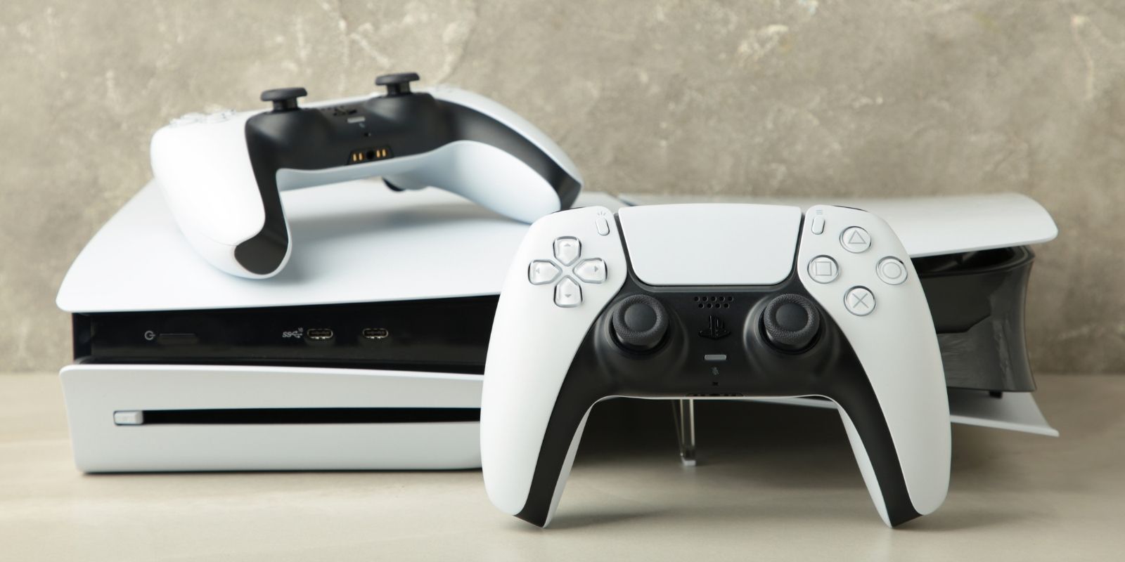 PS5 DualSense controller on a clean surface ready to be reset and paired with the console