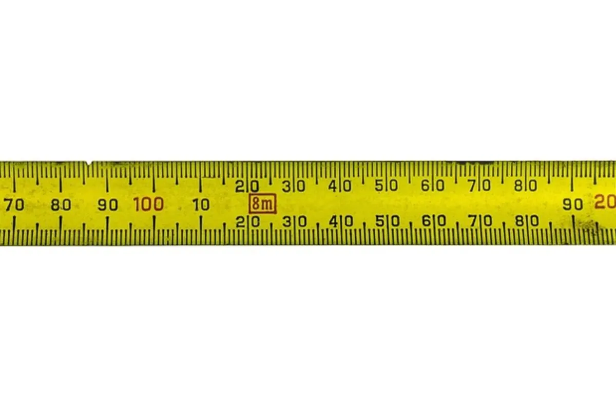 Measuring tape showing inches and feet for unit conversion