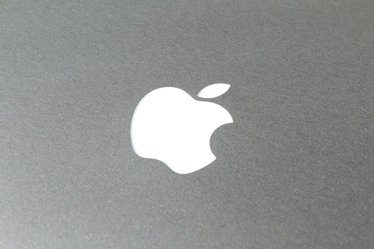 MacBook startup screen showing the Apple logo during boot