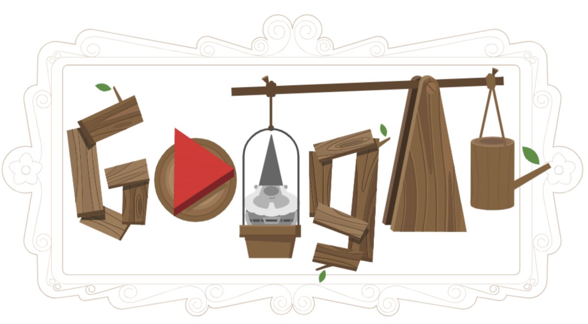 The Celebrating Garden Gnomes Google Doodle title screen showing the wooden Google logo and a gnome under a glass cloche